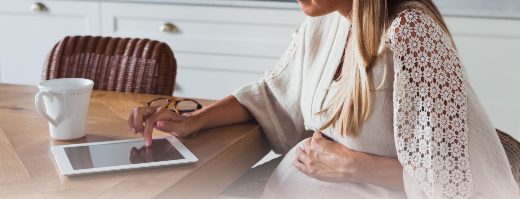 pregnant woman on computer