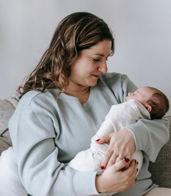 woman holding infant