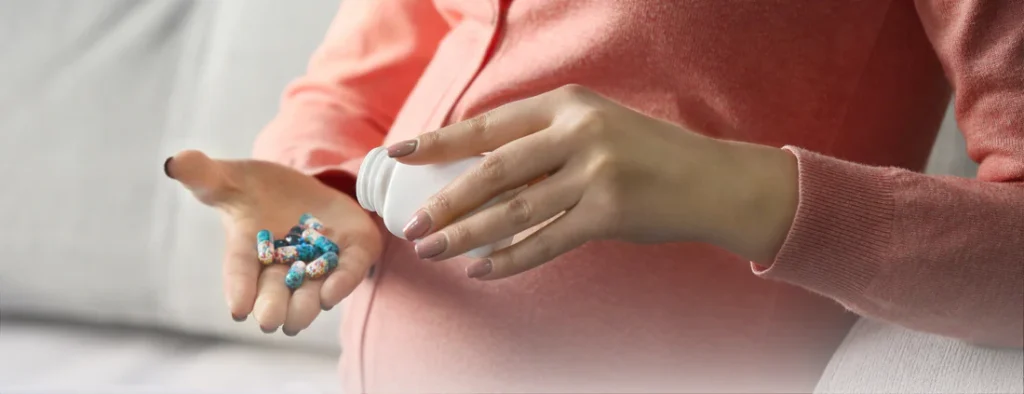 pregnant woman taking pills