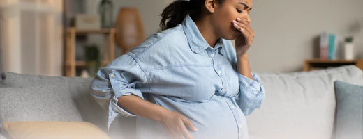 pregnant woman coughing